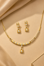 Golden Floral Drop Pendant Necklace & Earrings Set - Image 2
